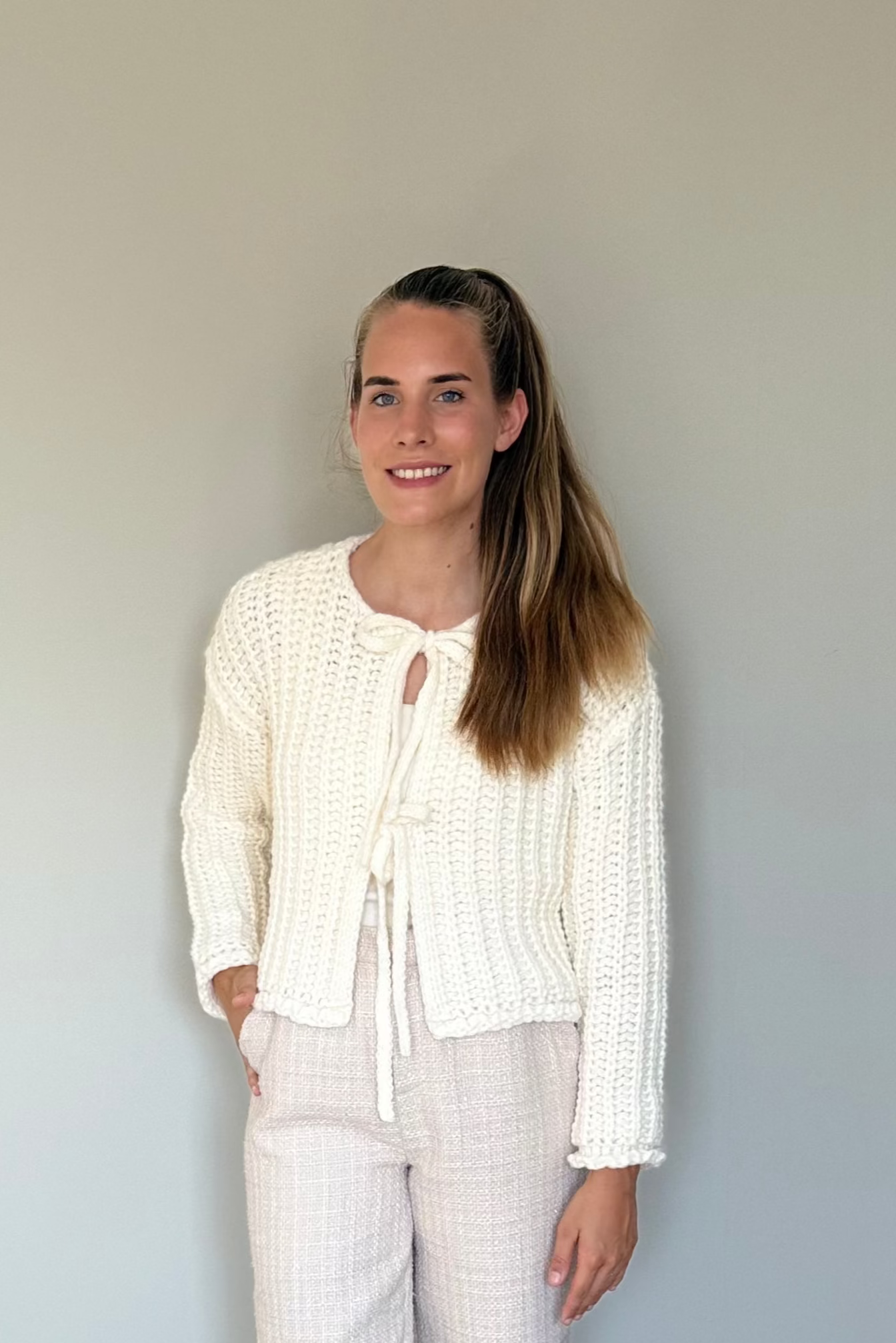 Livia vest crème met strikken