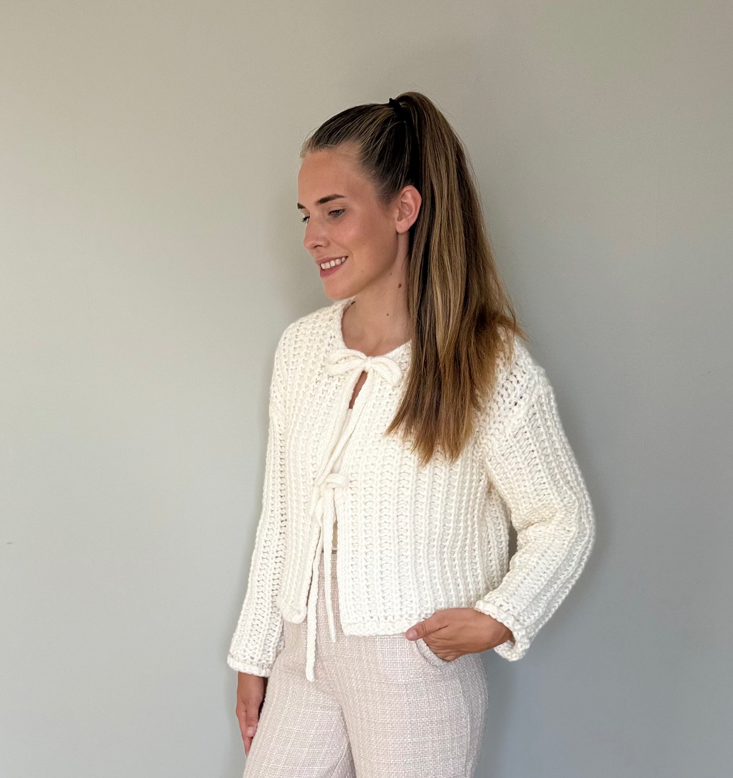 Livia vest crème met strikken